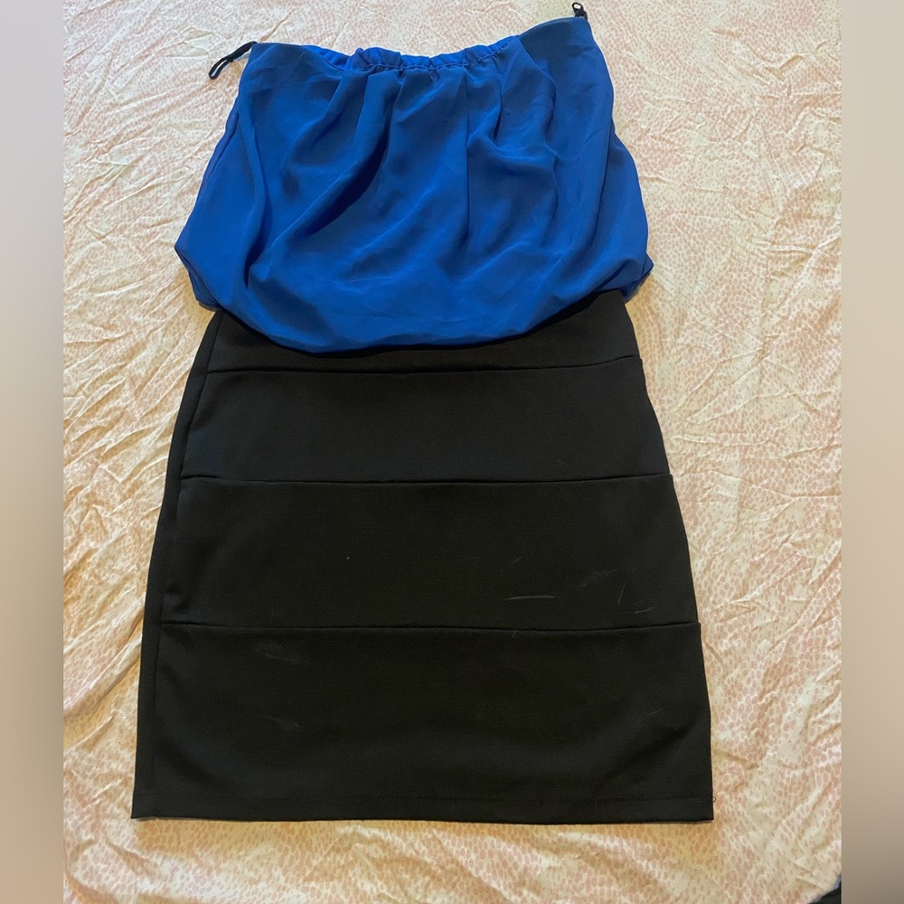 Size S. Dress that is tight and short. Blue & Black.